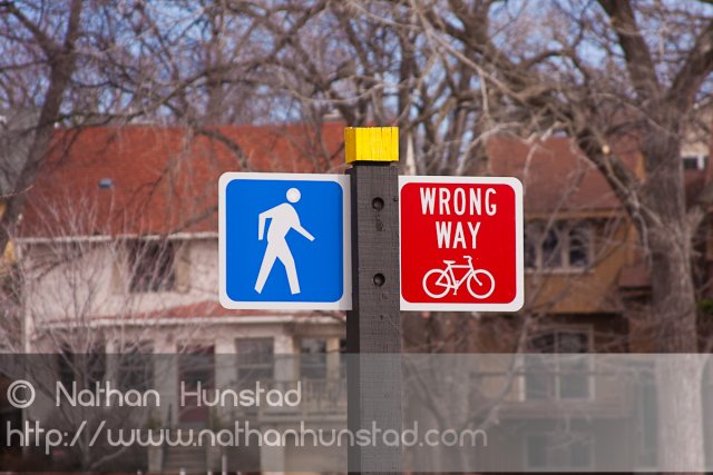Signs on the trail around Lake of the Isles.
